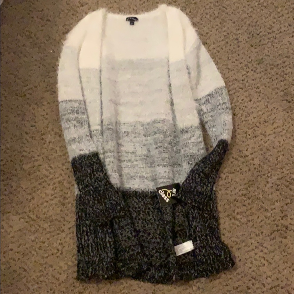 white, grey, and black sweater